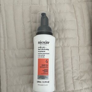 Nioxin Hair Thickening Treatment - White and Black